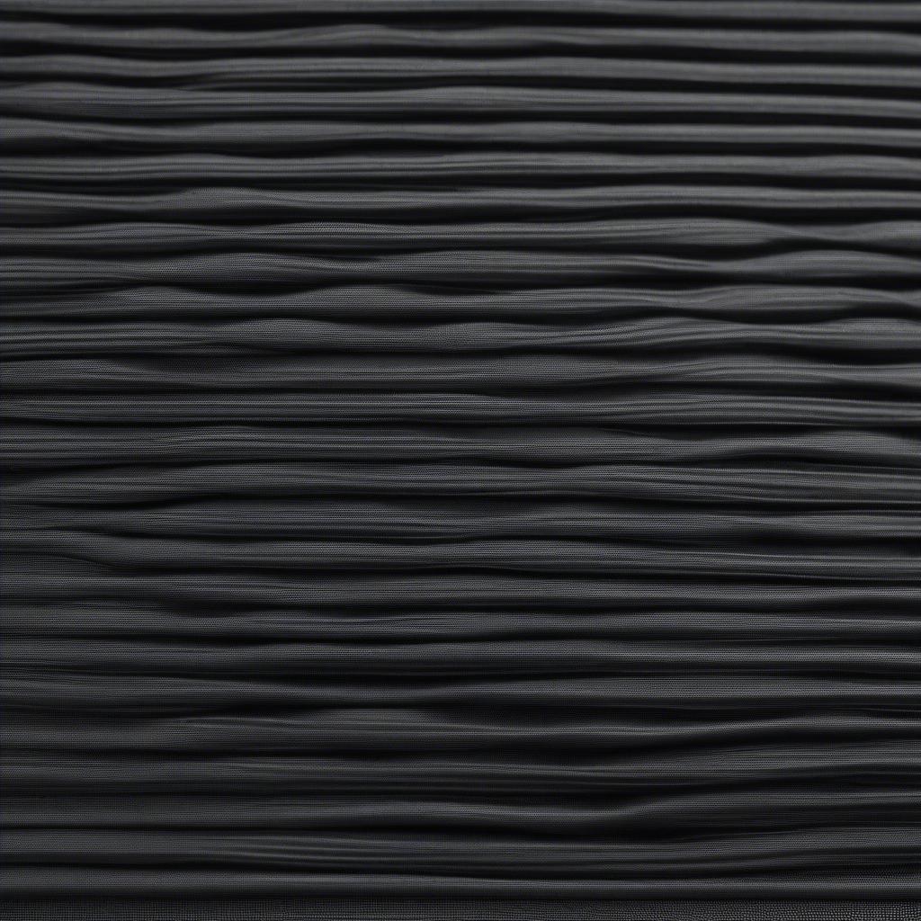 Close-up view of ballistic weave fabric showing tight interwoven fibers