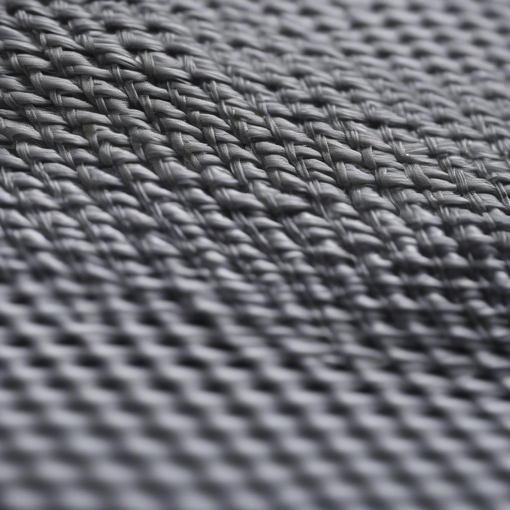 Close-up of a ballistic weave hat showing the tight weave pattern