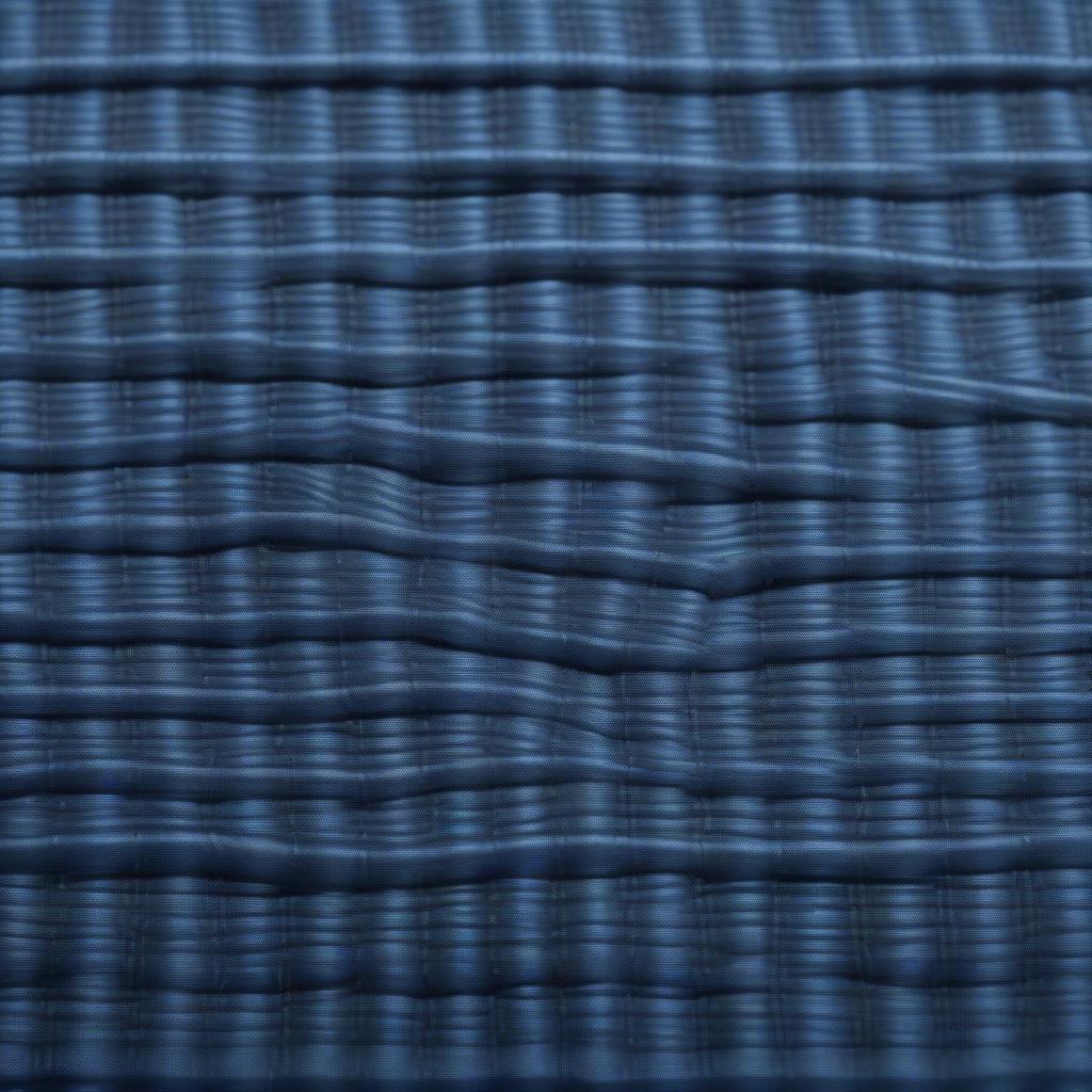 Close-up view of basket weave polyester fabric showcasing its textured pattern