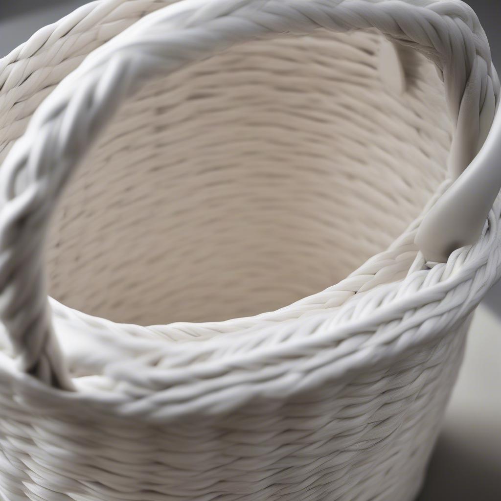 Close-up of a ceramic white weave basket handle