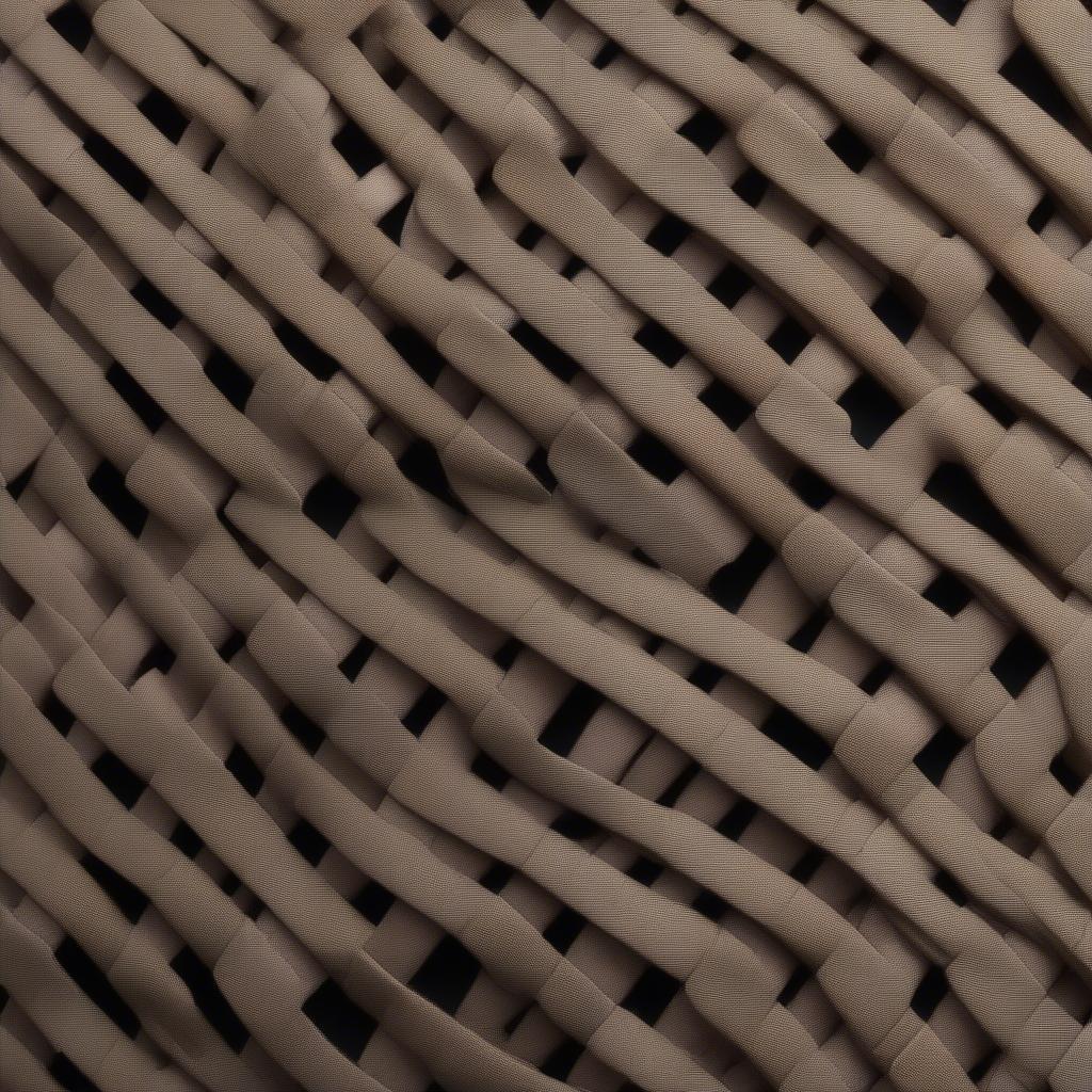 Close-up of the elastic strap weave on a child's chair, showing the intricate pattern and durable material.