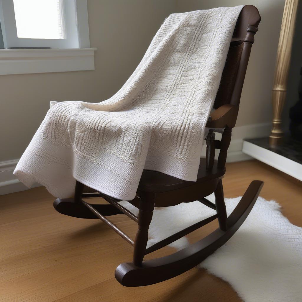 A completed basket weave baby blanket, showcasing the beautiful texture and cozy appeal.