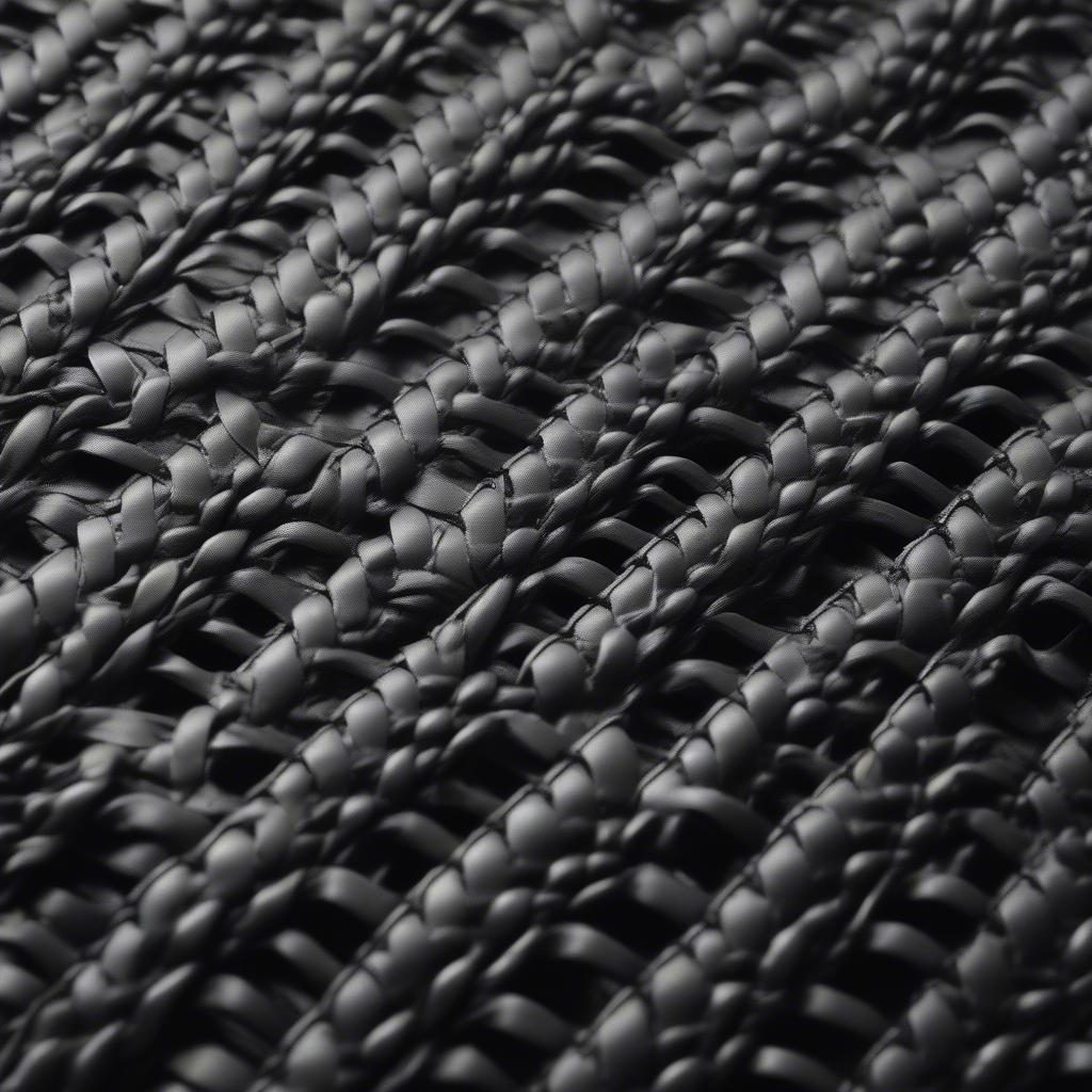 Close-up of the basket weave detail on a metal table