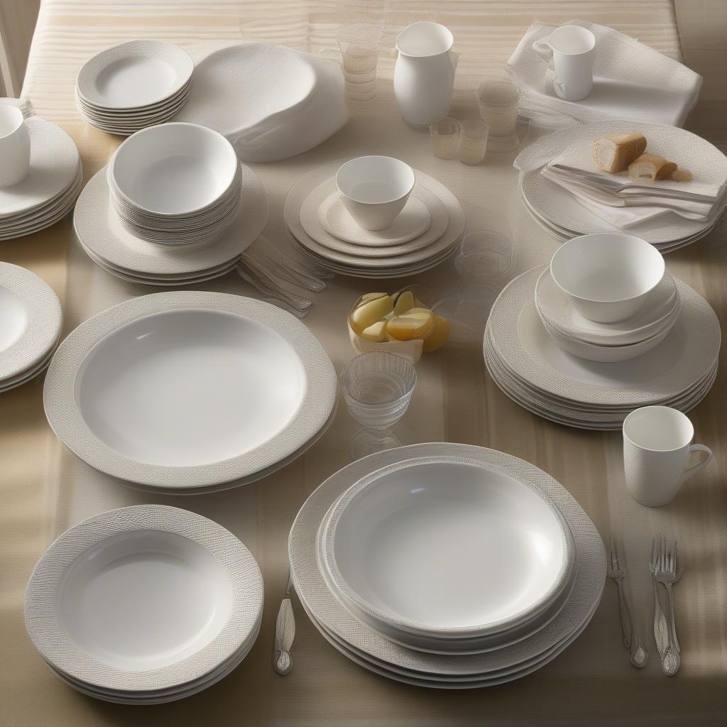 A complete Oneida basket weave dinnerware set displayed on a dining table