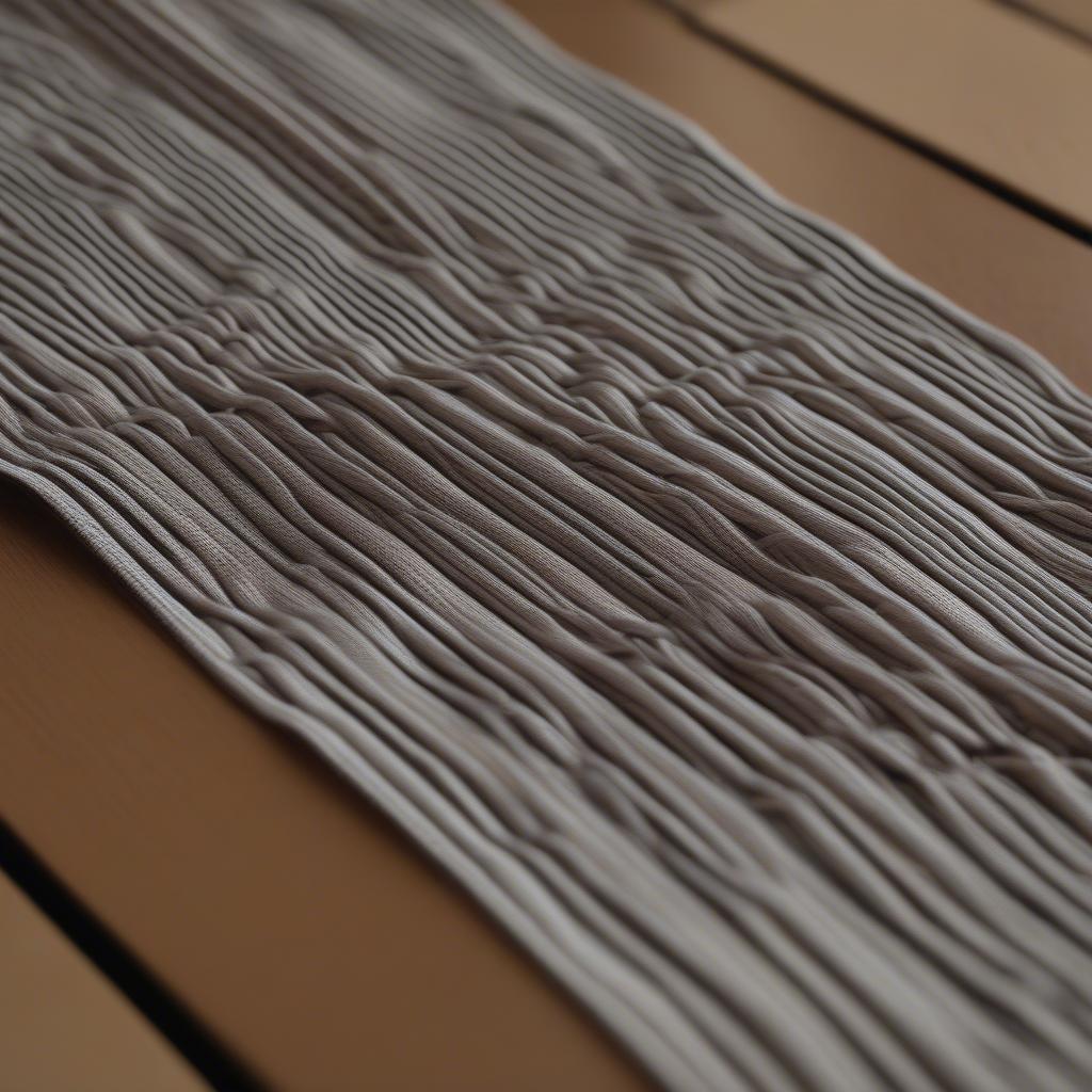 Close-up view of a rep weave table runner showing the distinctive ribbed texture