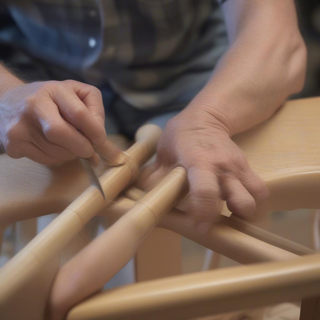 Securing Woven Rocking Chair with New Spline