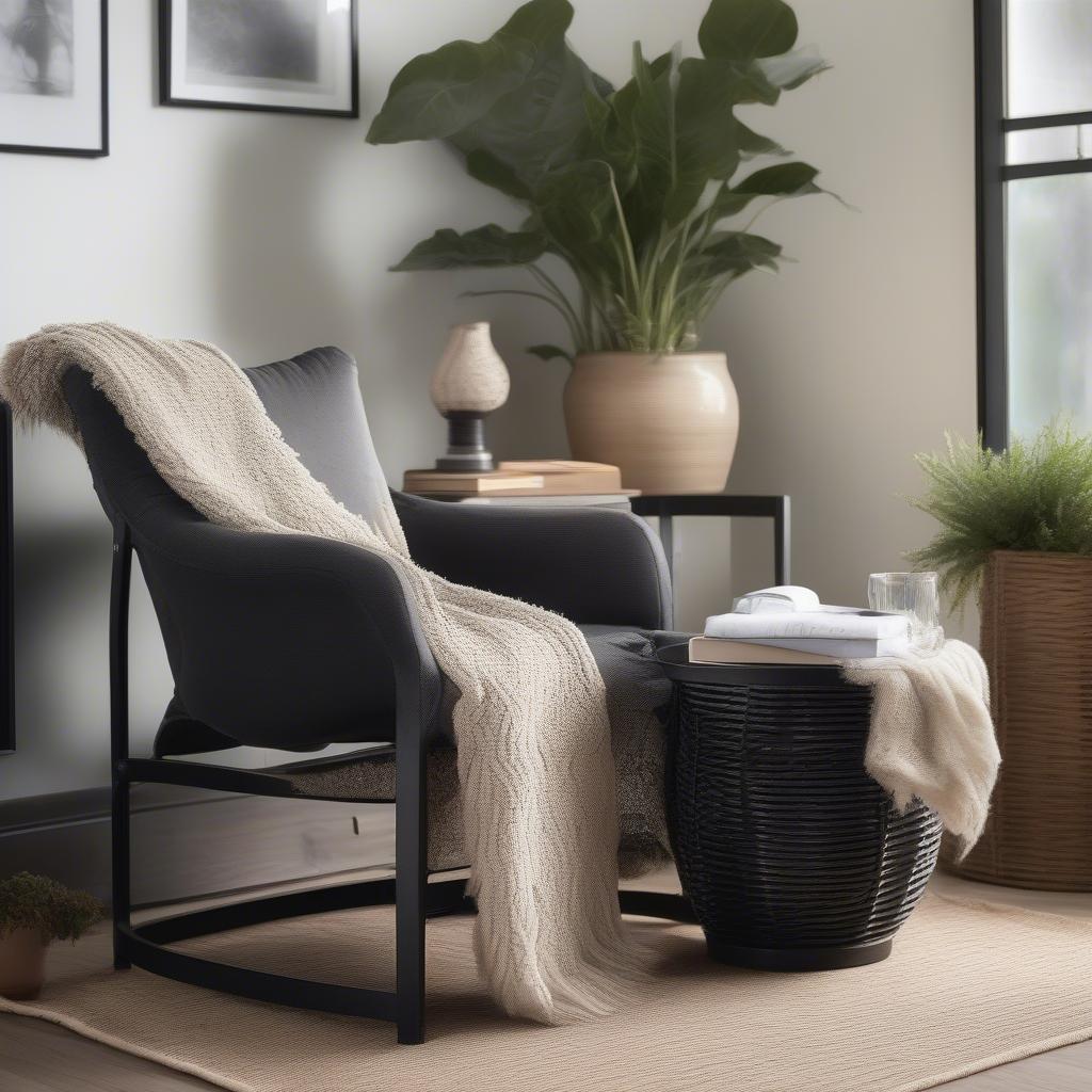 Small black metal table with basket weave trim in a living room setting