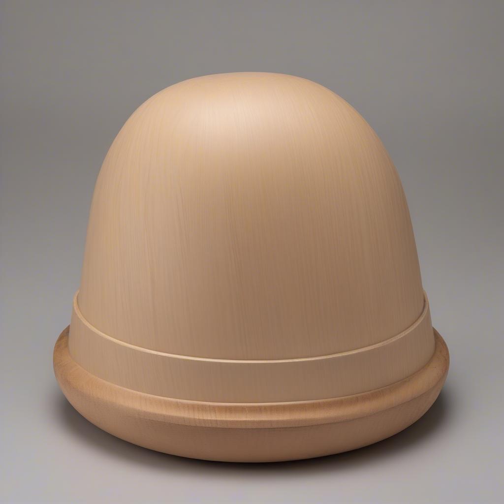 Wooden hat mold used in traditional straw hat making