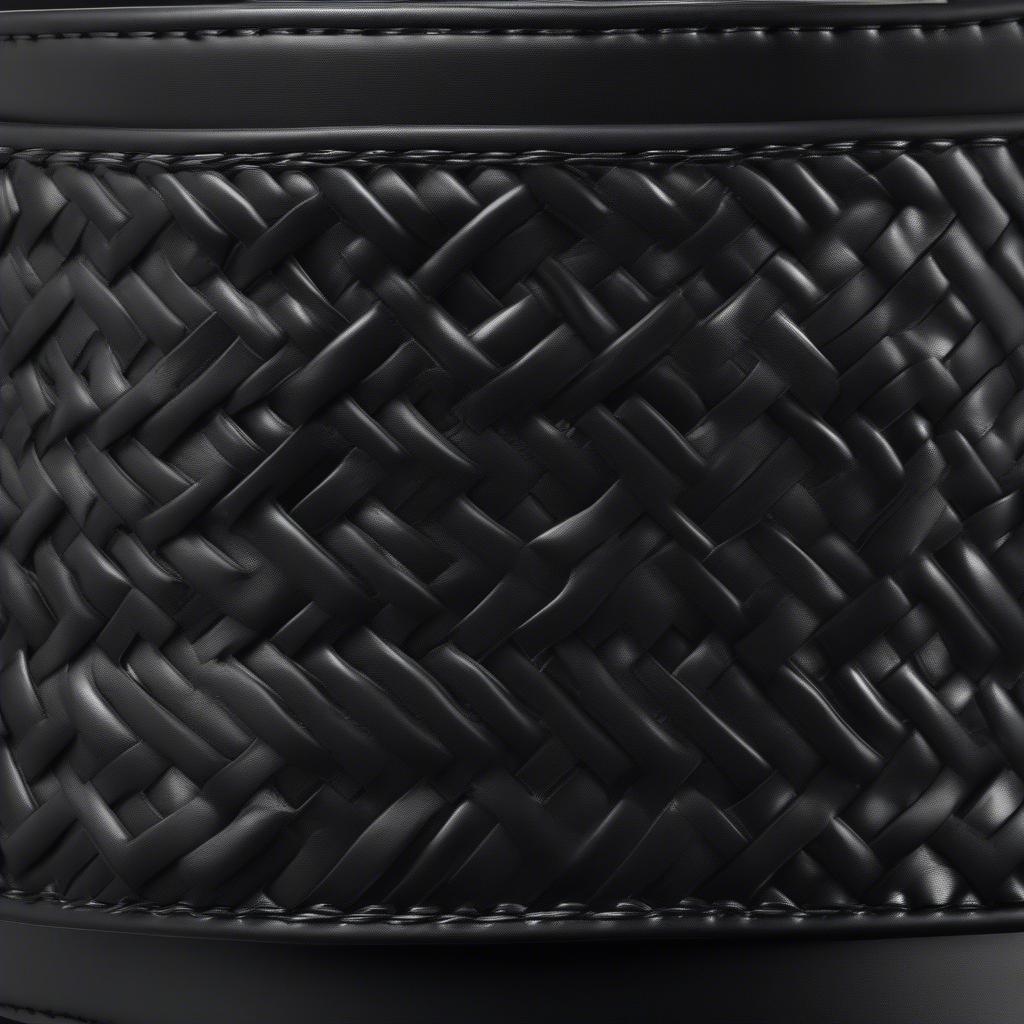 Close-up view of a 2 inch duty belt basket weave