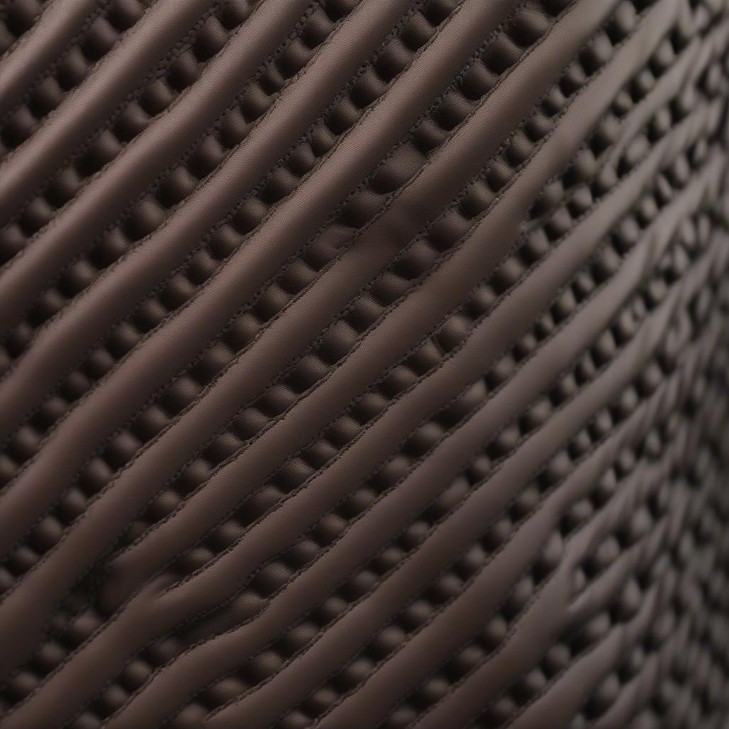 Close-up of the Accumold Elite Flat Glove Pouch Basket Weave