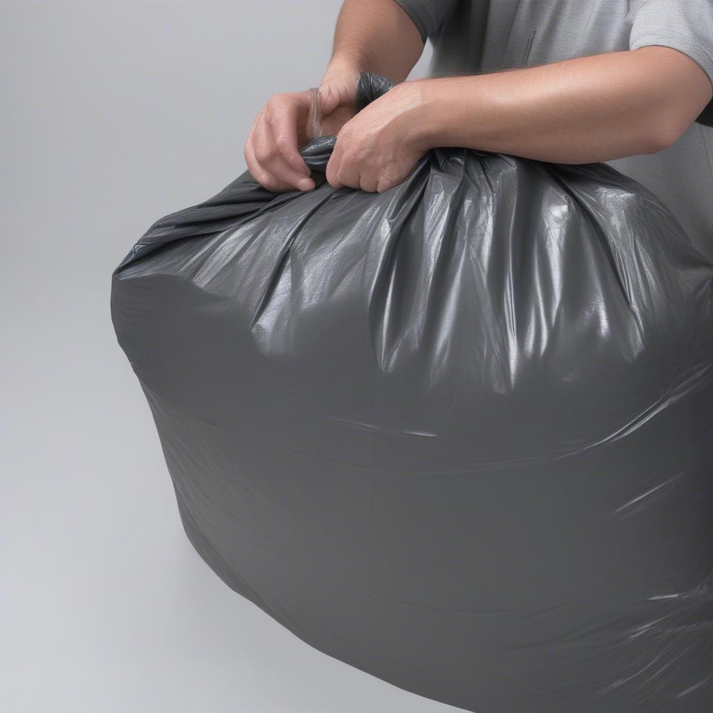 AWP 89-Gallon Trash Bag Demonstrating Strength