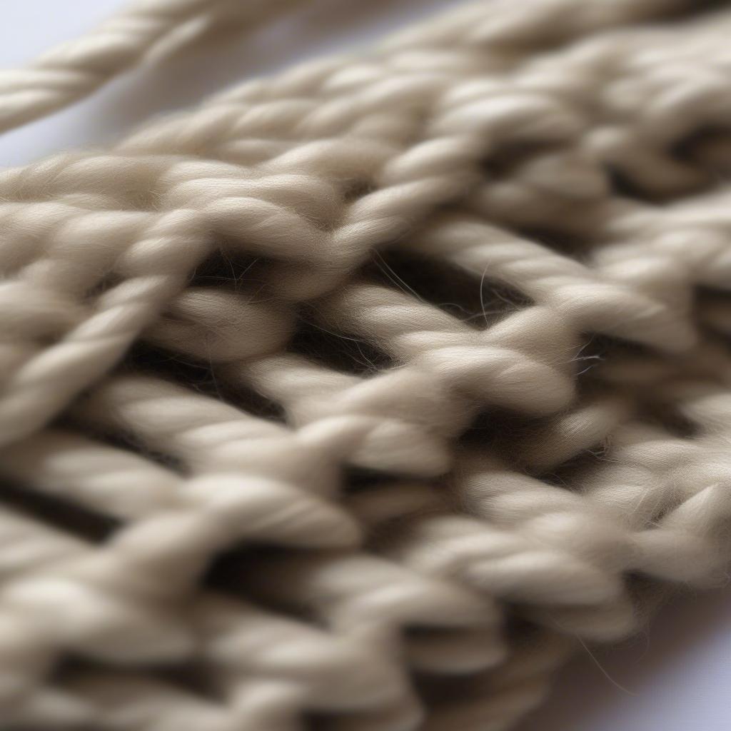 Close-up of spiral, loop, and square knot stitches