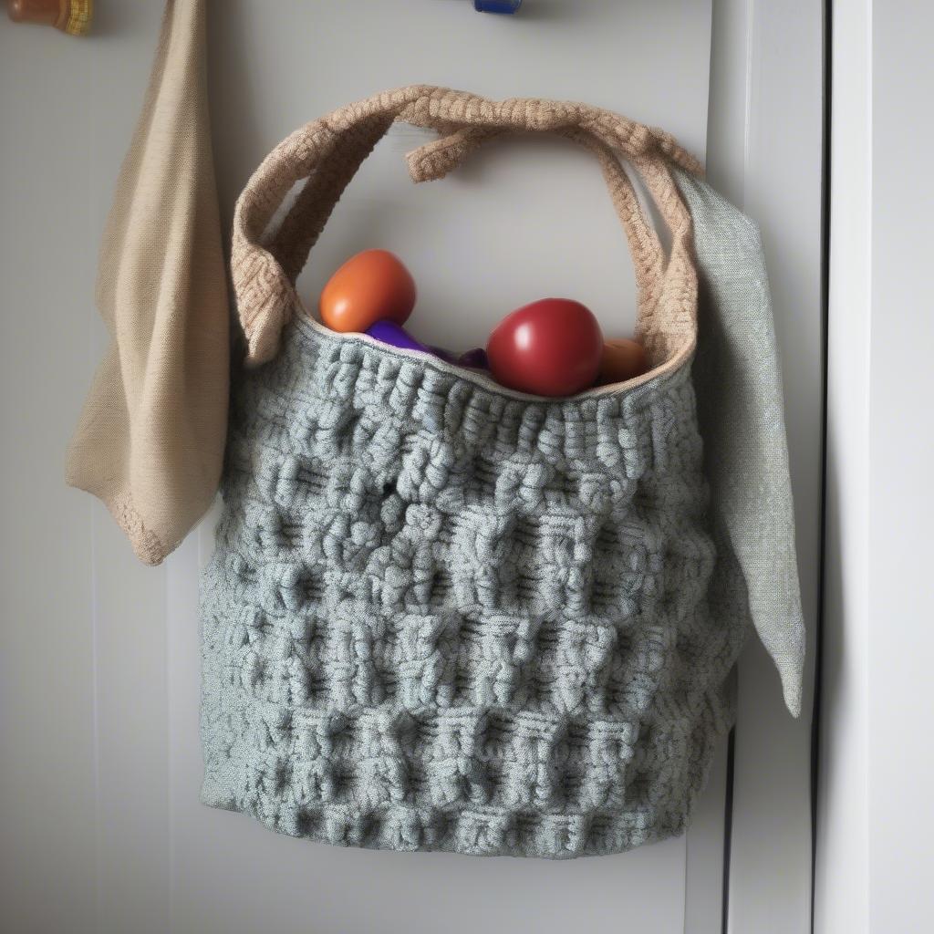 A finished basket weave crochet bag, showcasing its practicality and stylish design.