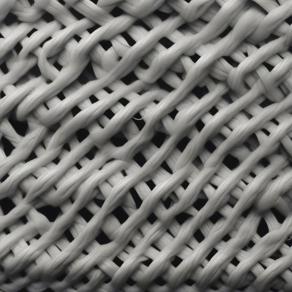 Close-up view of basket weave elastic showing its interwoven structure