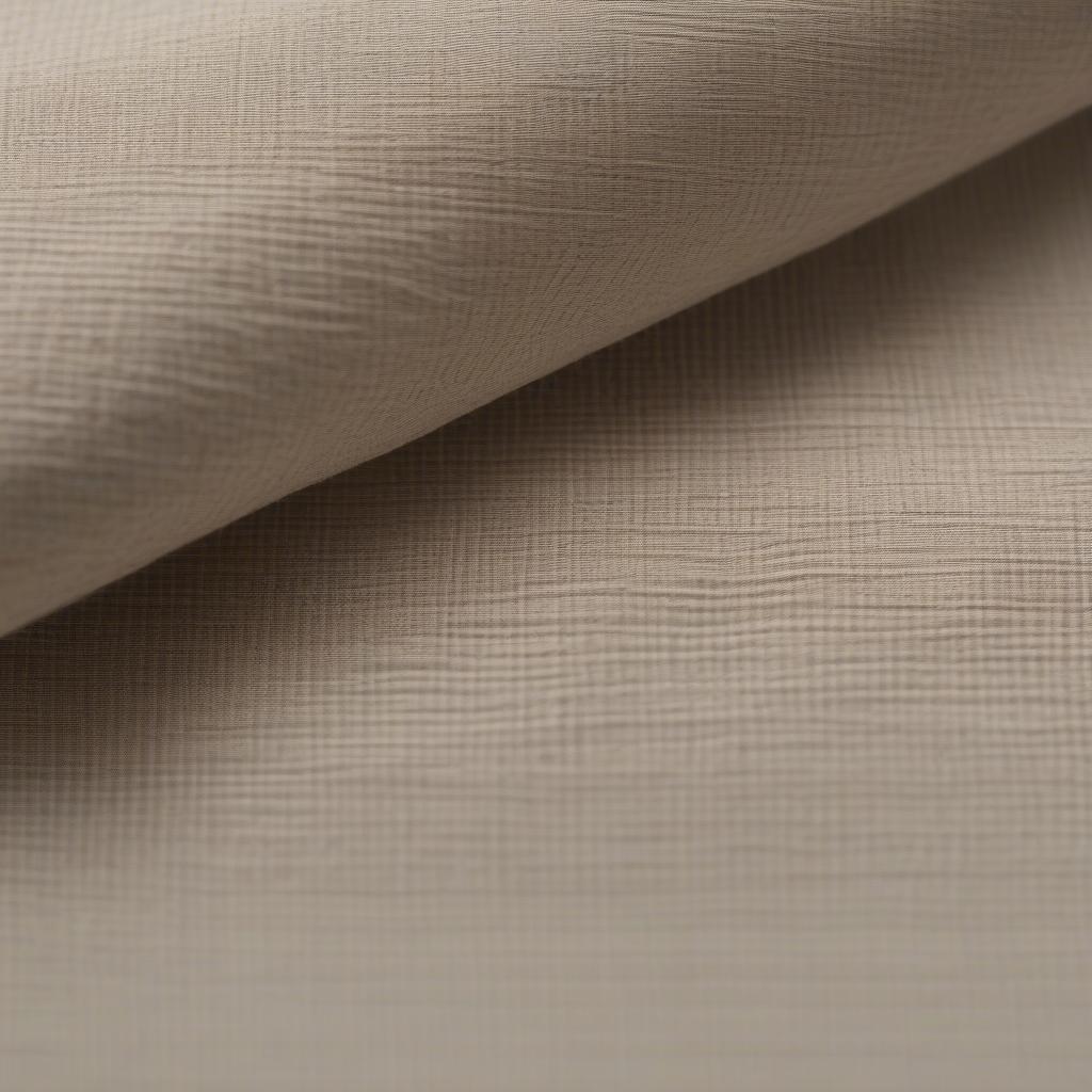 Close-up of Basket Weave Linen Oatmeal Fabric