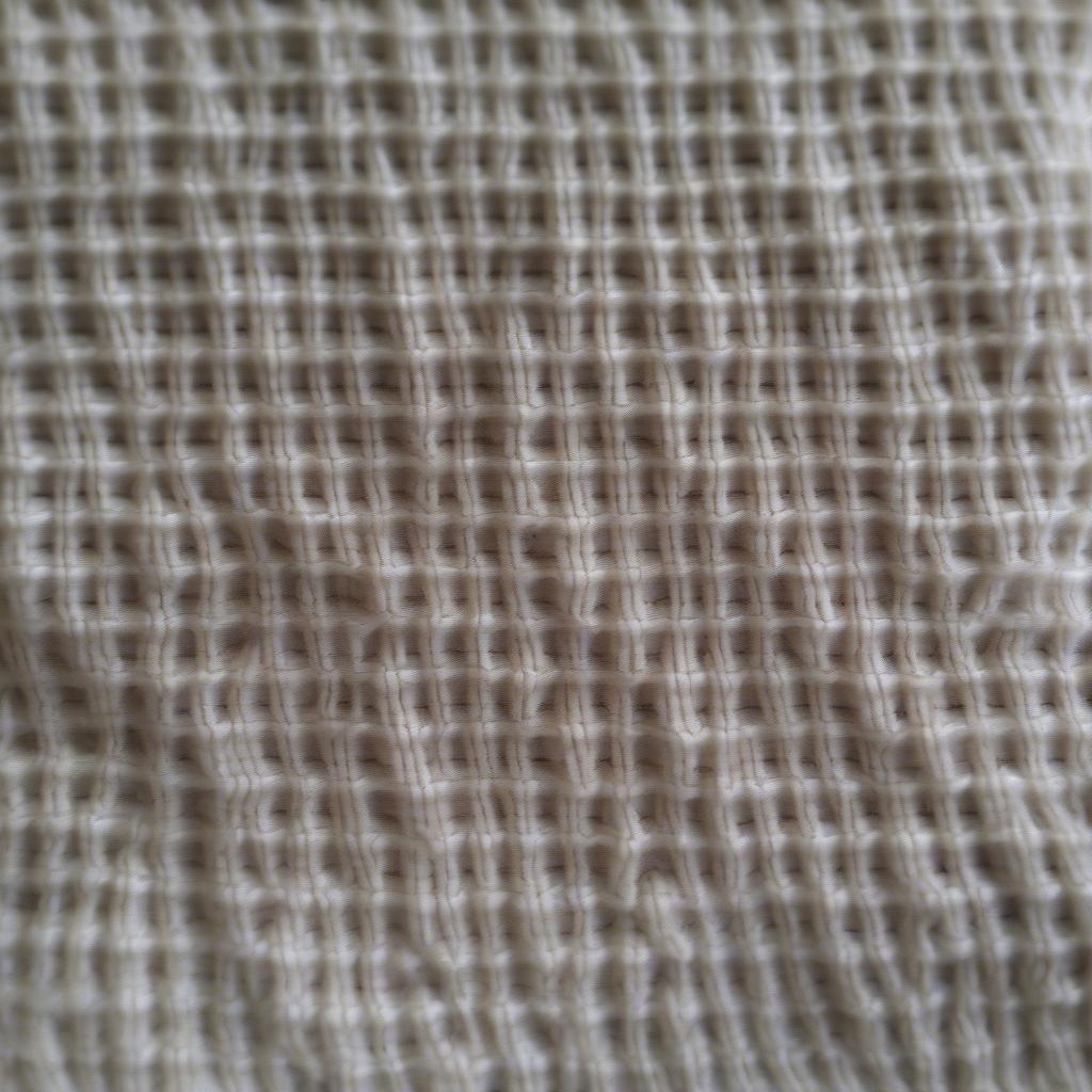 Close-up view of the basket weave stitch showing the texture and detail