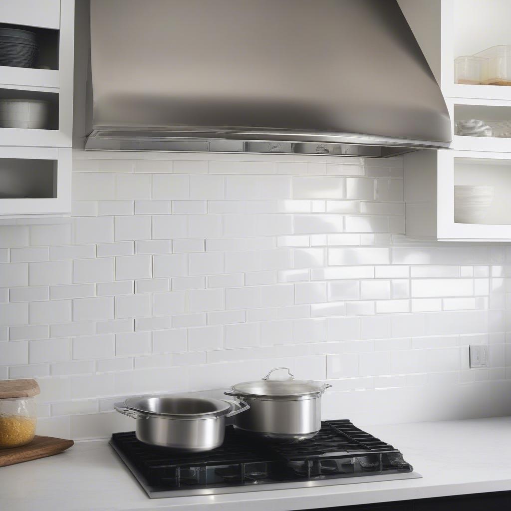 Basket weave tiles used as a kitchen backsplash, showcasing a classic and elegant design.