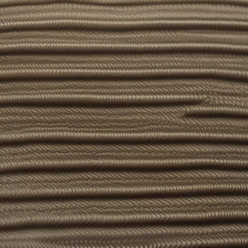 Close-up view of basket weave upholstery fabric showcasing its intricate texture and durable weave