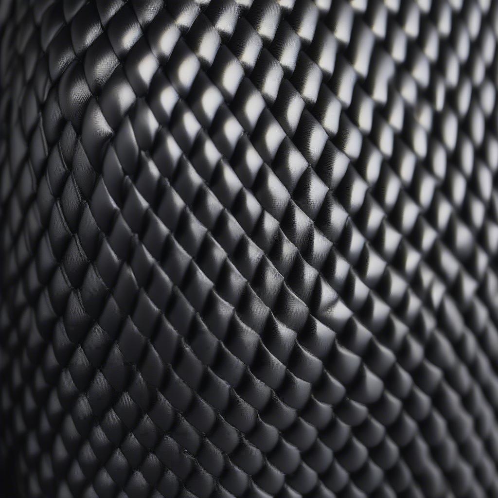 A motorcycle helmet wrapped in basket weave vinyl, showcasing its use in personalizing accessories.