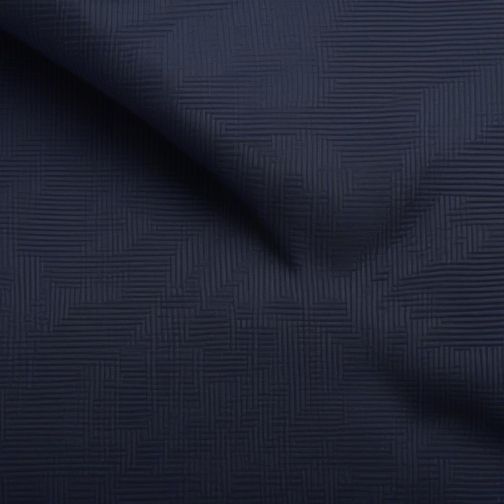 Detailed view of the basket weave texture on the Brielle navy sham.