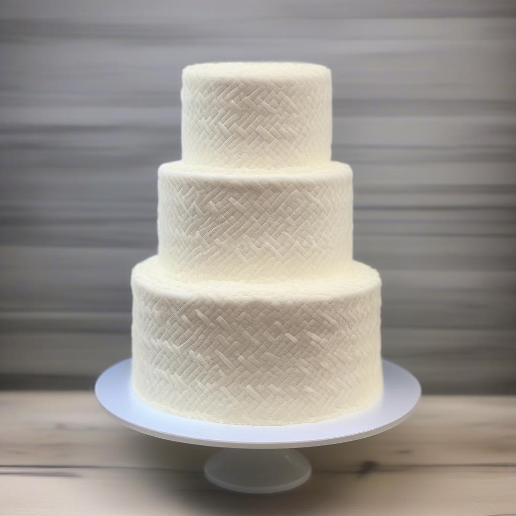 Buttercream frosting piped in a basket weave pattern on a cake