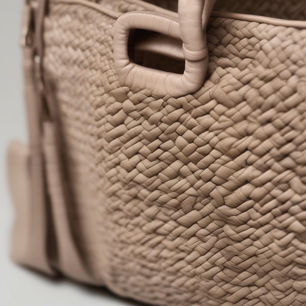 Close-up view of the intricate woven pattern on a Claramonte Diego bag