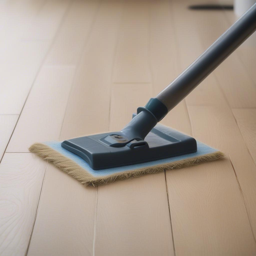 Cleaning basket weave laminate flooring with a damp mop