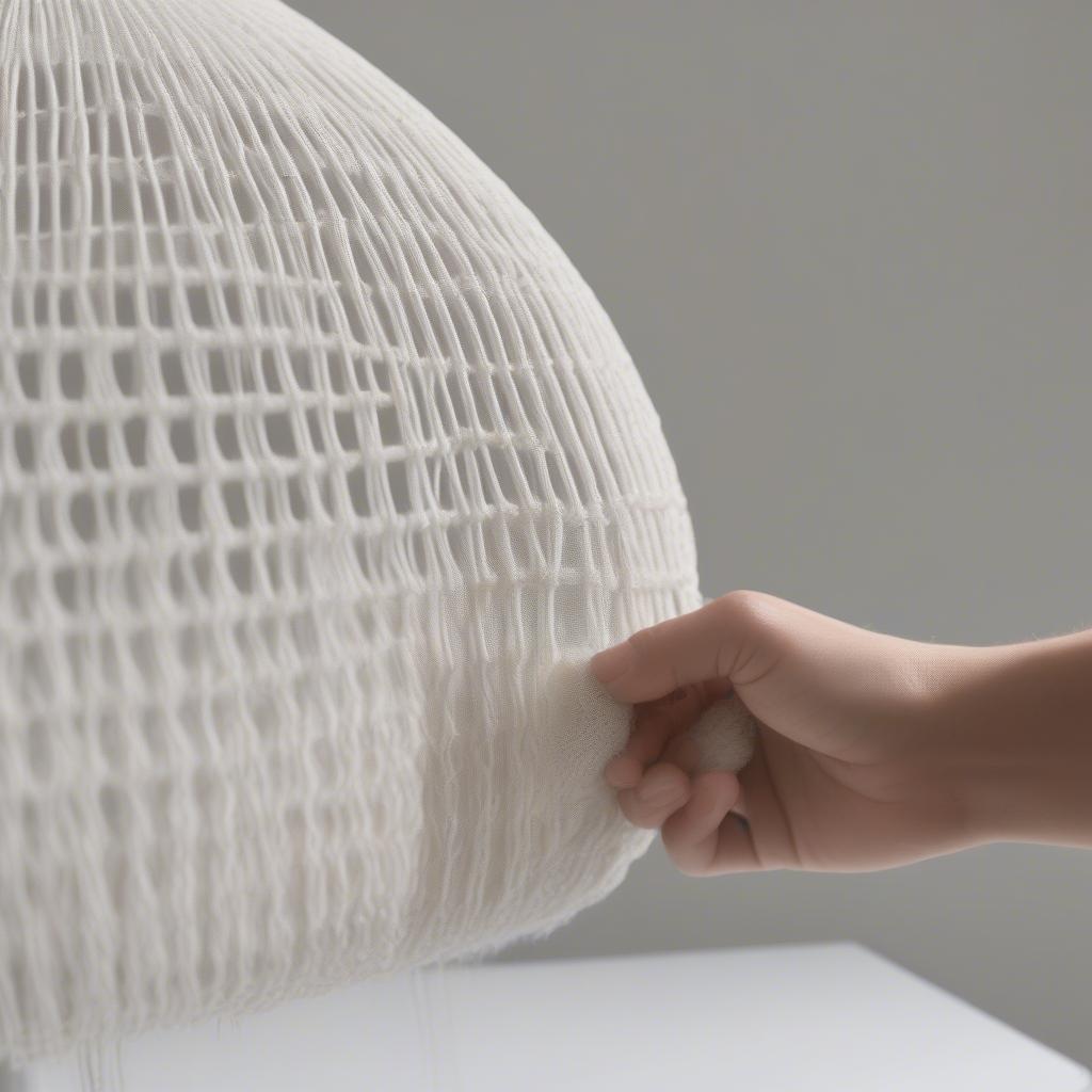 Cleaning a White Open Weave Table Lamp