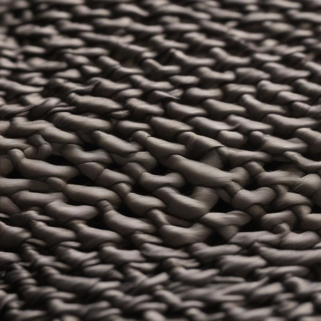 Close-Up of Hand Stitching on Basket Weave Suit