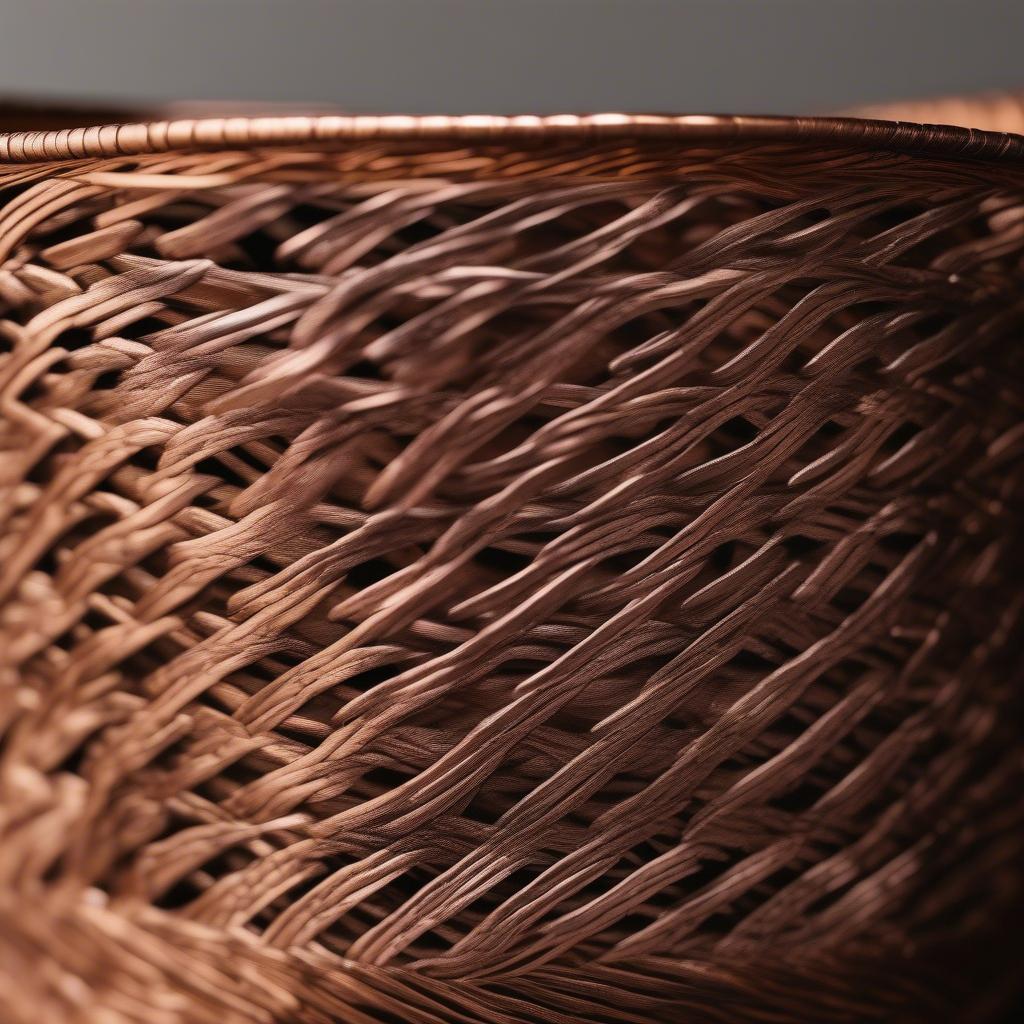 Close-up of a copper weave basket, showcasing the intricate details of the weaving pattern and the warm metallic sheen of the copper.