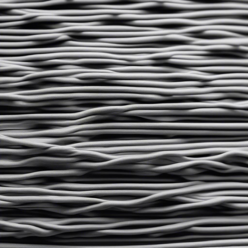 Close-up of a corded weave pattern on an outdoor lounge chair