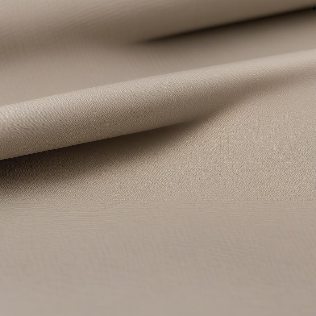 Close-up view of crosshatched non-woven fabric