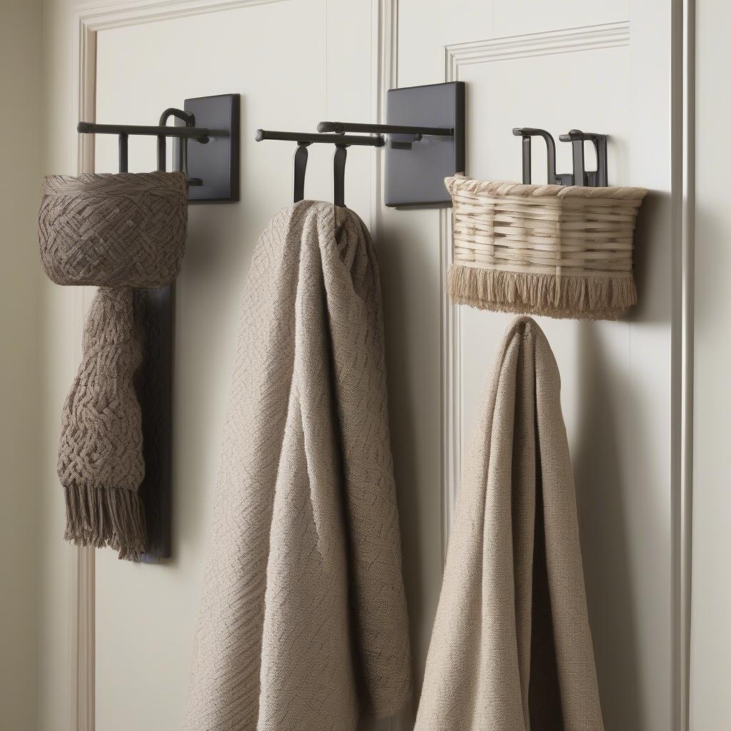 Different styles of hooks suitable for displaying basket weave blankets, including wall-mounted, over-the-door, and decorative options.