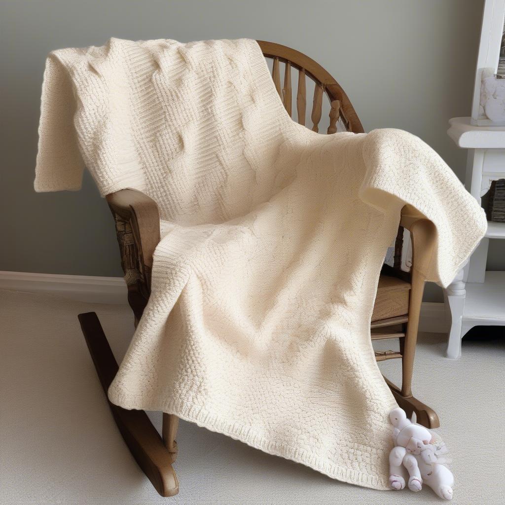 A completed crochet basket weave baby blanket, ready for gifting