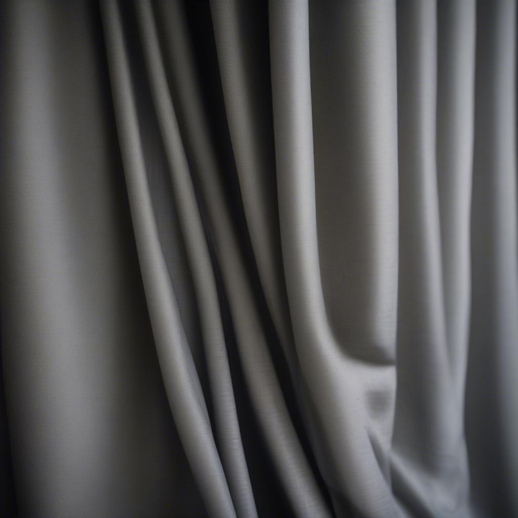 Close-Up of Grey Basket Weave Curtain Texture