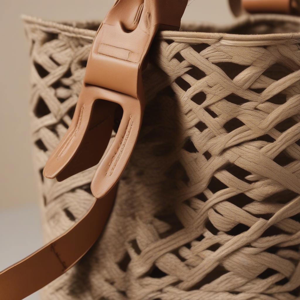 Close-up view of a jute die cut bucket bag showcasing intricate woven patterns and earthy terra tones