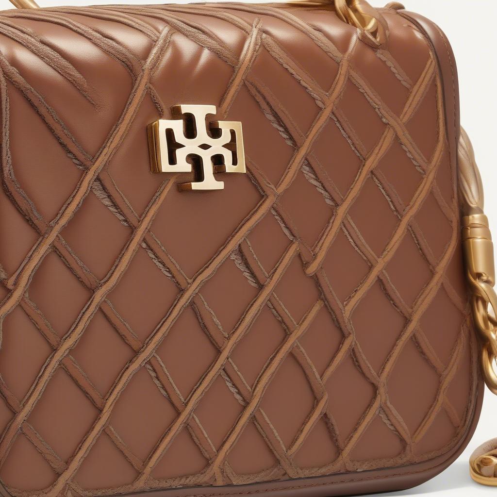 Close-up of the Kira Small Diamond Woven Convertible Shoulder Bag showing its intricate woven pattern and leather details.