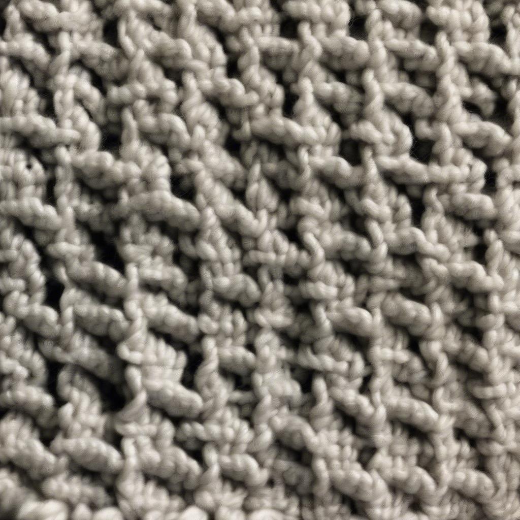 A completed swatch of the left-handed crochet basket weave stitch, showcasing the textured pattern.