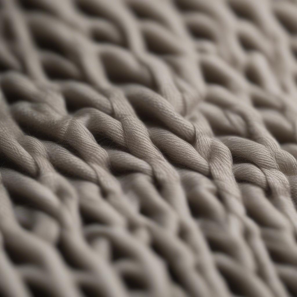 Detailed view of the linen weave texture on a Lucas Wire Base Chair