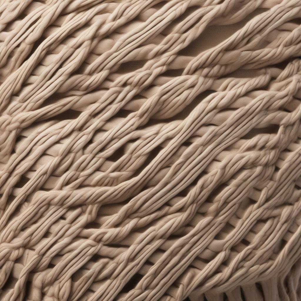 Close-up view of the Mara Hoffman basket weave pattern