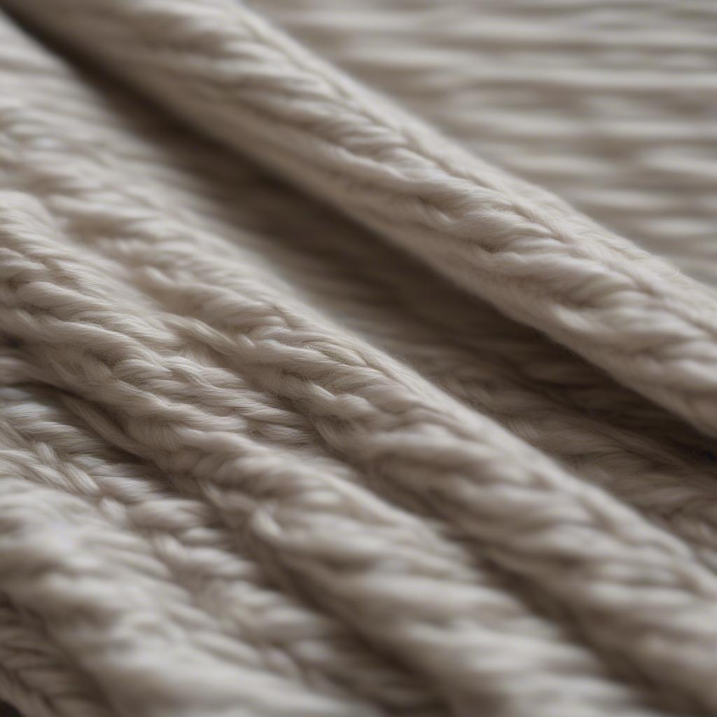 Close-up view of the intricate texture of mountain weave table linens