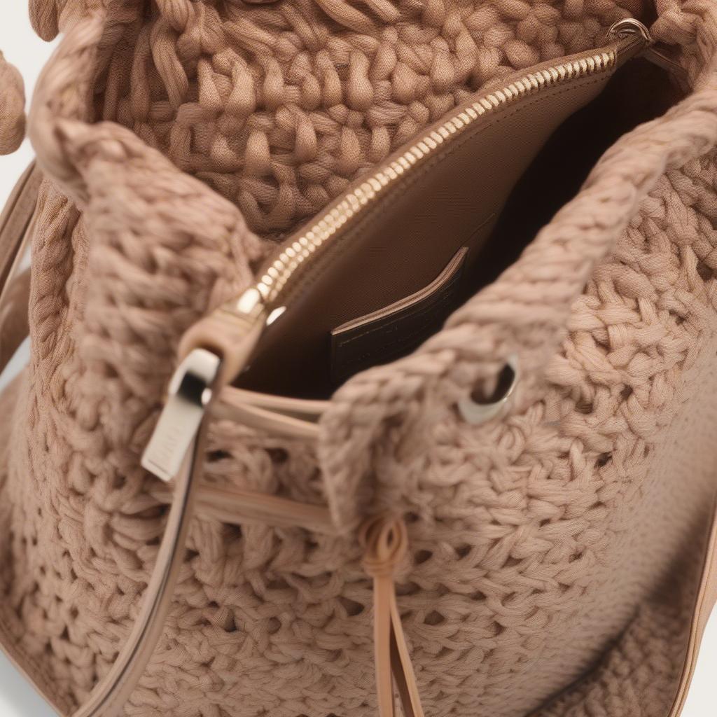 Close-up of the Nine West Crochet Woven Bucket Bag Drawstring