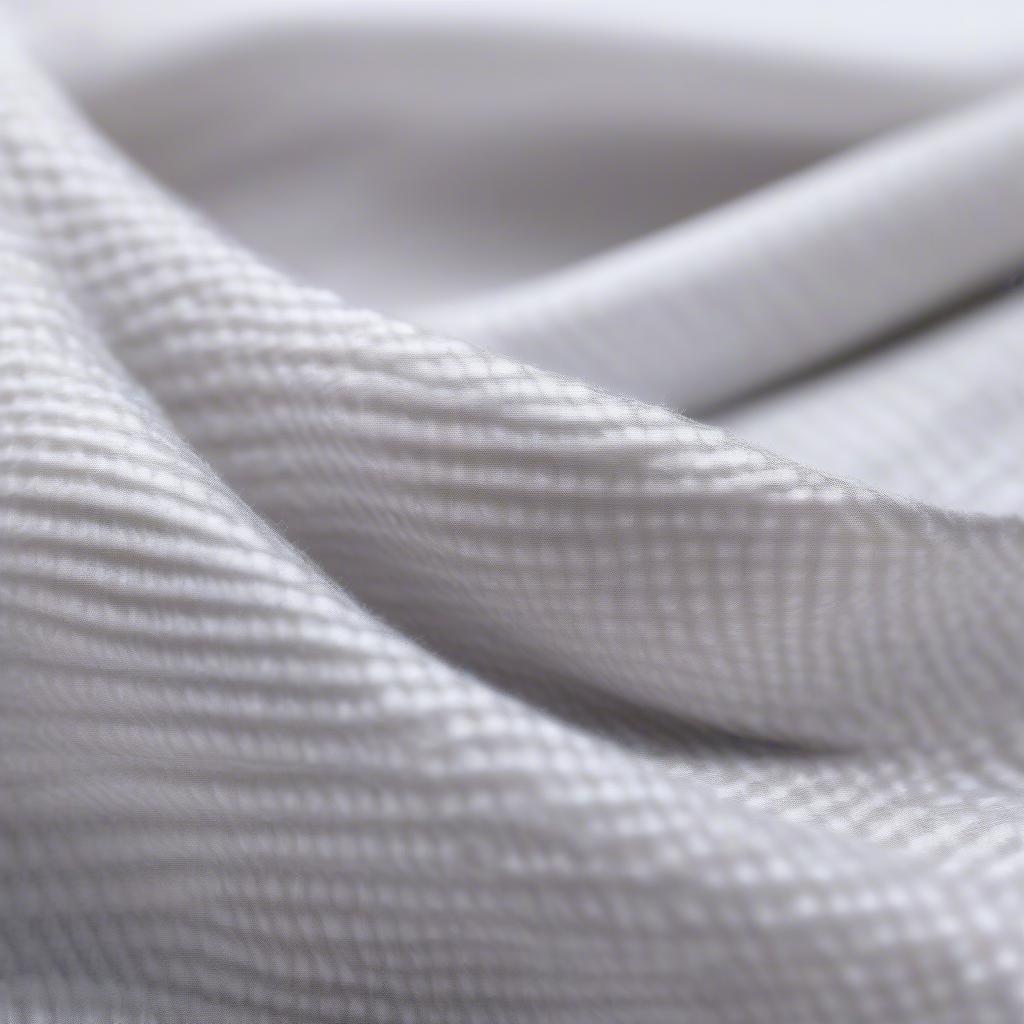 Close-up view of non-woven fabric showing its texture and fiber structure