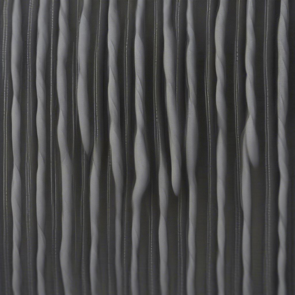 Non-Woven Fabric Structure: A microscopic view of the bonded fibers in a non-woven fabric, showcasing its unique structure and how it differs from traditional woven materials.