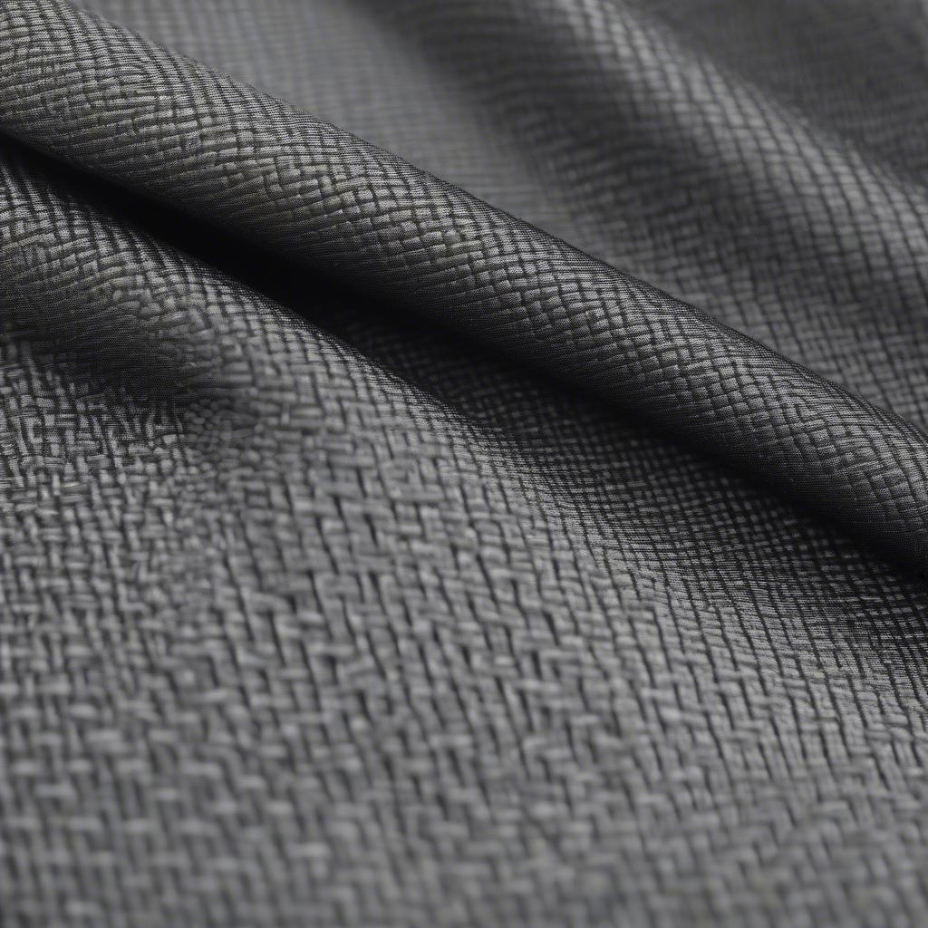 Close-up view of poly basket weave fabric showing texture and weave pattern