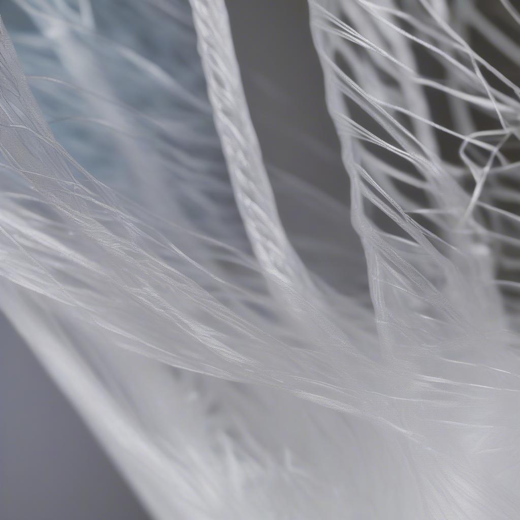 Close-up view of the woven structure of a PP transparent bag