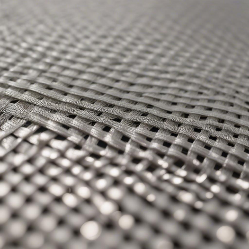 Close-up of Silver Basket Weave Placemats