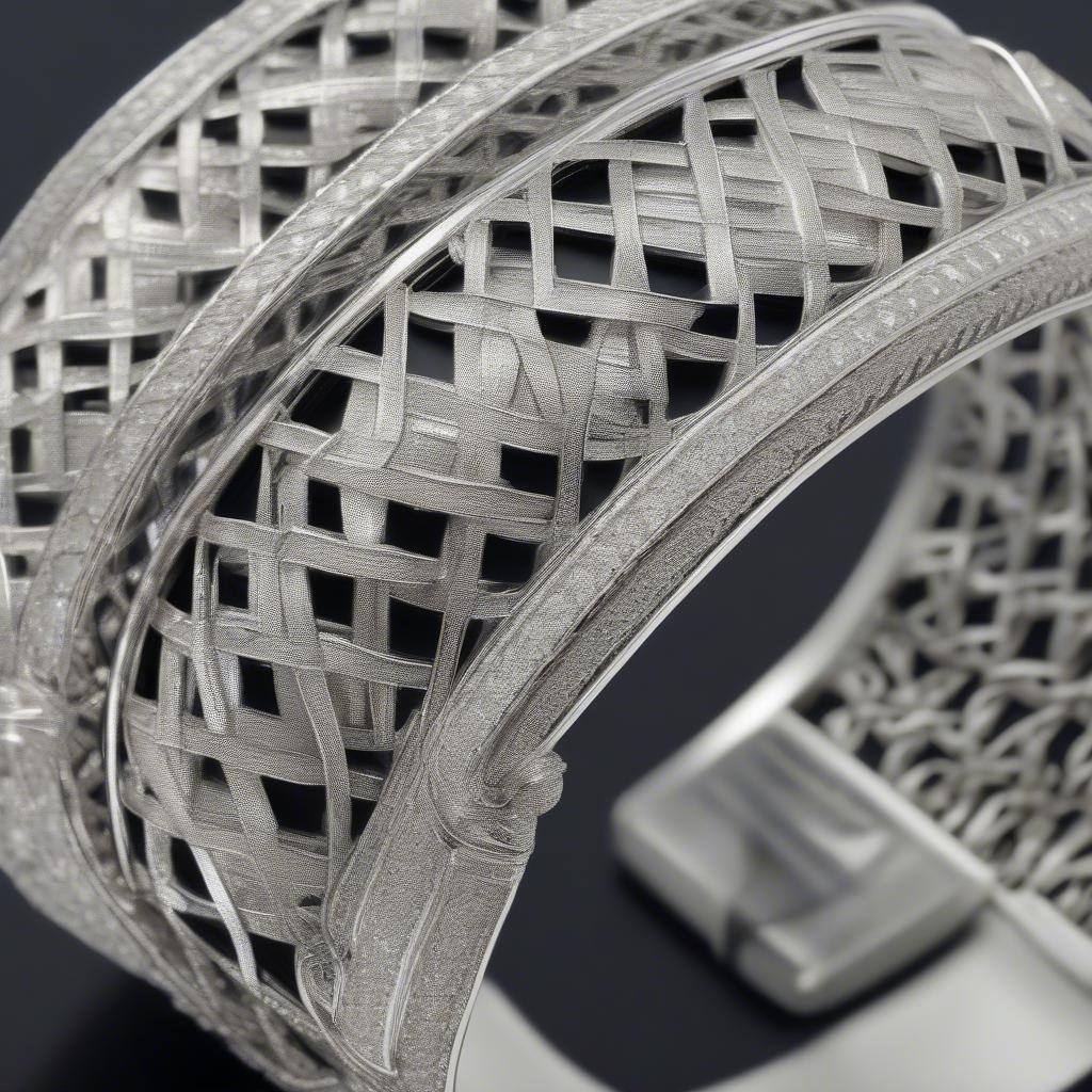 Sterling Silver Basket-Weave Cuff Bracelet with Diamonds: A close-up view showcasing the intricate basket-weave pattern on a sterling silver cuff, highlighting the sparkle of 23 tcw diamonds.