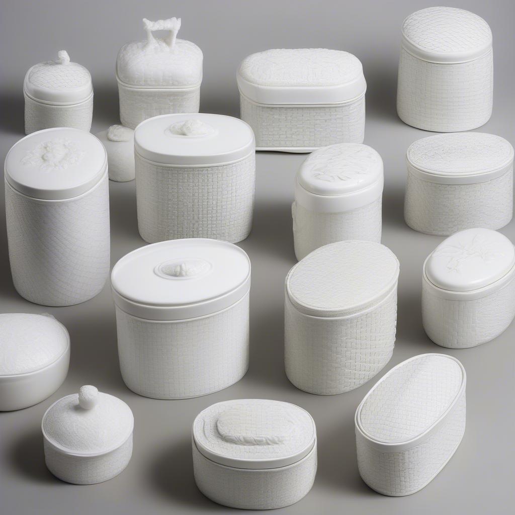 A collection of white oval porcelain basket weave boxes in various sizes and styles, showcasing different basket weave patterns and lid designs.