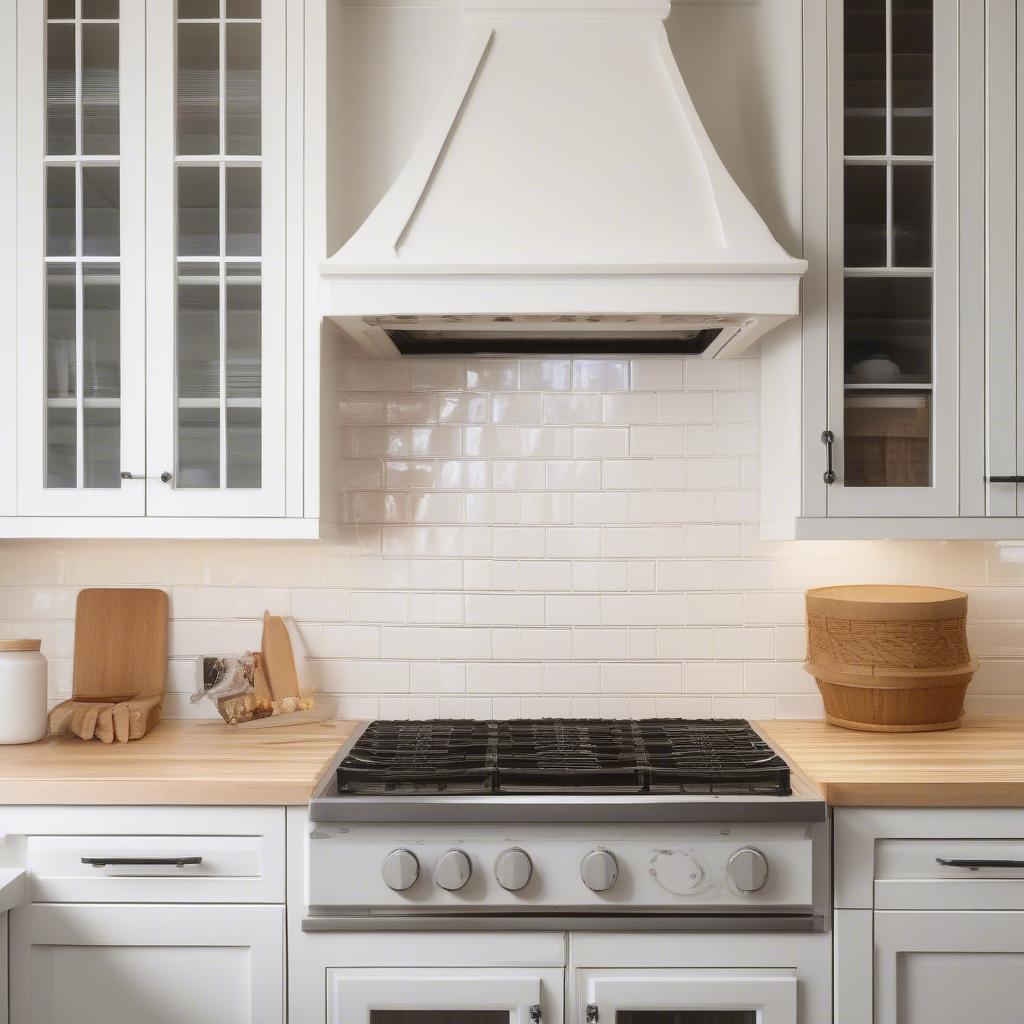 White Ceramic Basketweave Tile Backsplash in a Traditional Kitchen